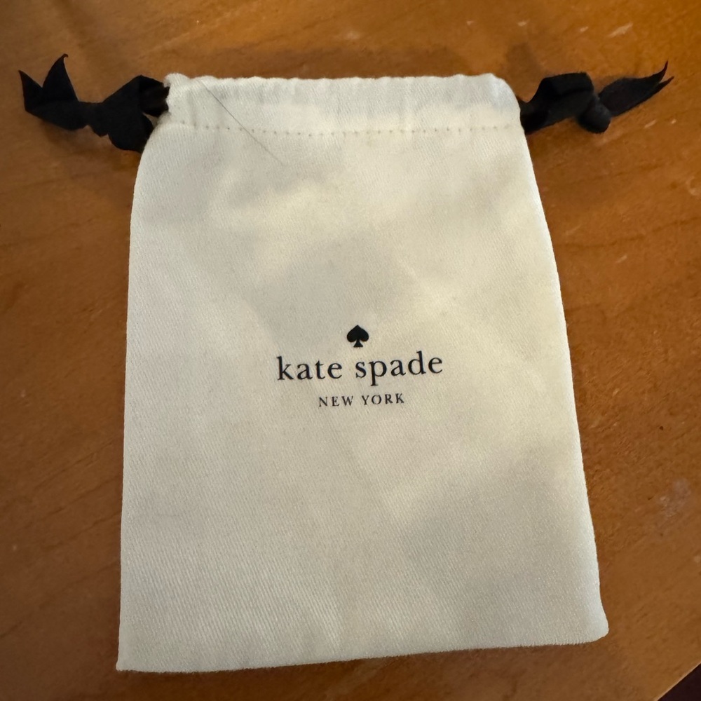 Kate Spade Ivory Pouch with Black Accents